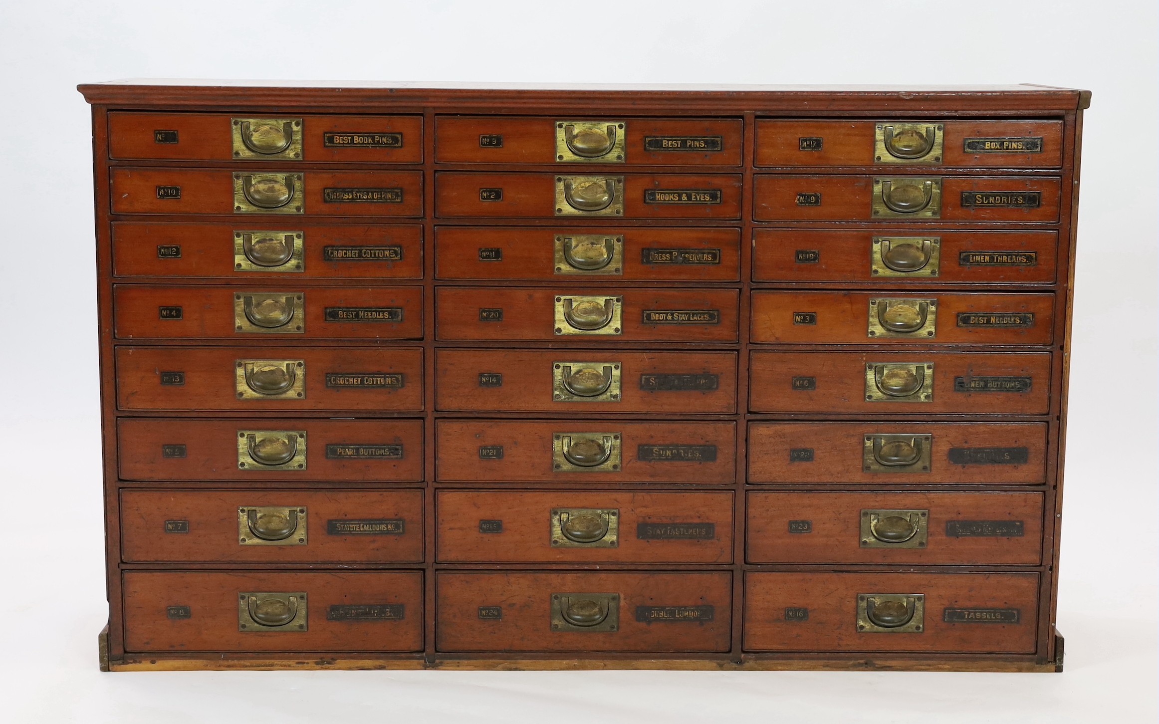 A Victorian mahogany haberdashery cabinet of twenty four drawers